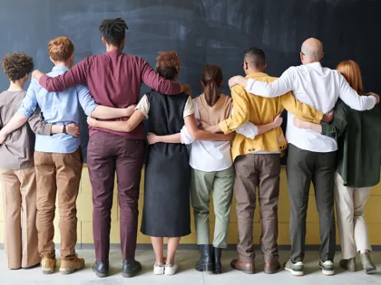 group-of-people-standing-indoors-3184396.jpg