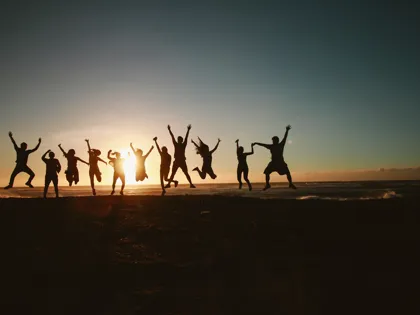 silhouette-photography-of-group-of-people-jumping-during-1000445.jpg